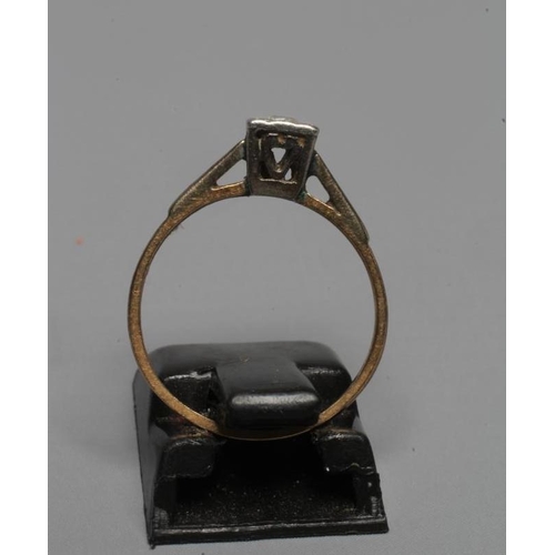 277 - A SOLITAIRE DIAMOND RING, the old brilliant cut stone point set in a square plaque to a plain shank ... 