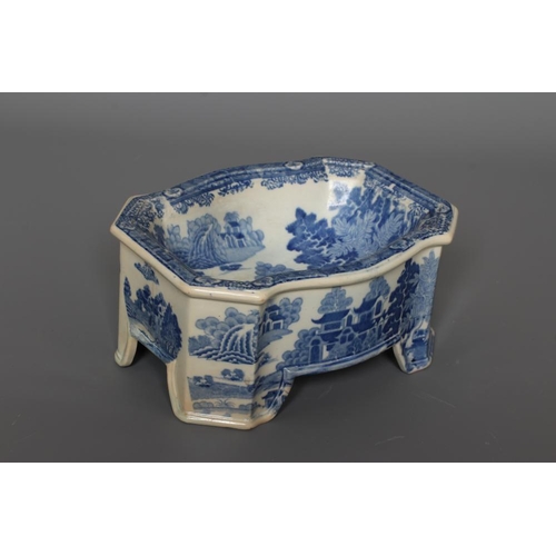 28 - A SPODE PEARLWARE FOREST LANDSCAPE PATTERN DOG BOWL, early 19th century, of canted oblong form on br... 