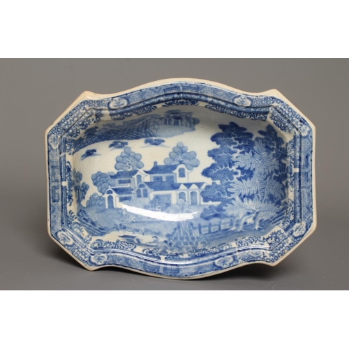 28 - A SPODE PEARLWARE FOREST LANDSCAPE PATTERN DOG BOWL, early 19th century, of canted oblong form on br... 