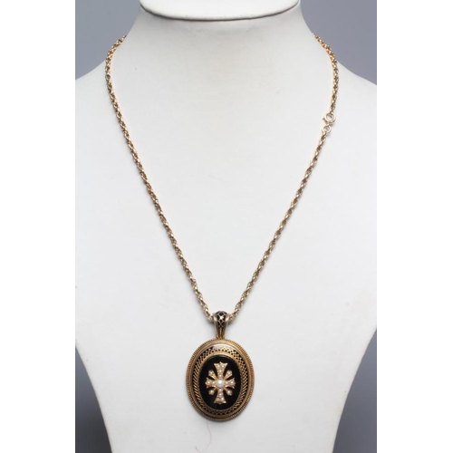 288 - A VICTORIAN MOURNING PENDANT, the oval black onyx panel centred by an inset cross set with seed pear... 