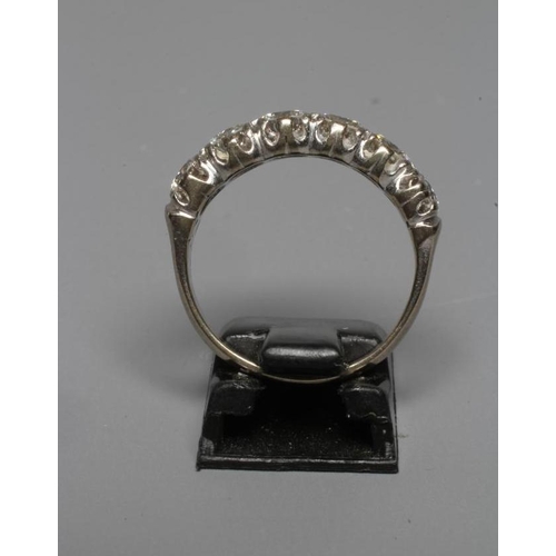 293 - A SIX STONE DIAMOND RING, the round brilliant cut stones each of approximately 0.40cts (TCW approx. ... 