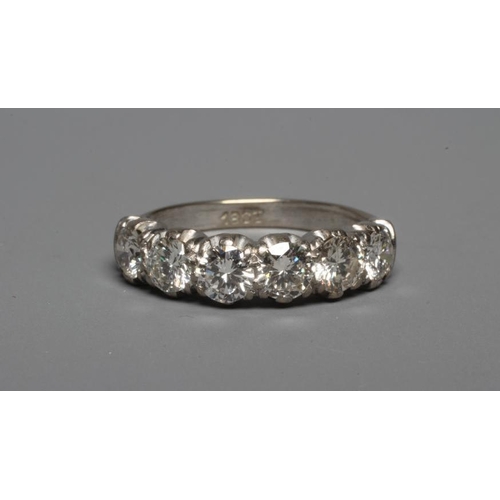 293 - A SIX STONE DIAMOND RING, the round brilliant cut stones each of approximately 0.40cts (TCW approx. ... 