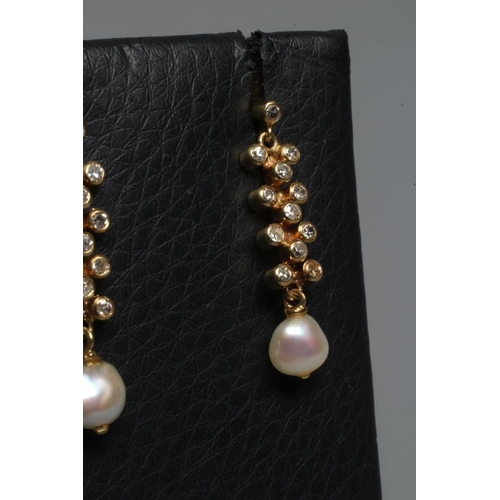 303 - A PAIR OF DIAMOND AND FRESHWATER PEARL DROP EARRINGS, the pearls hung from a bar set with eleven sma... 