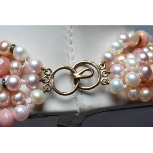 320 - A MODERN FRESHWATER PEARL TORSADE NECKLACE with Peruvian pink opal and tourmaline bead spacers, with... 