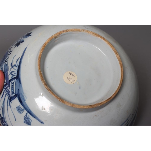 38 - A DELFT COLANDER BOWL, probably London c.1750, of plain circular form, the exterior painted in blue ... 