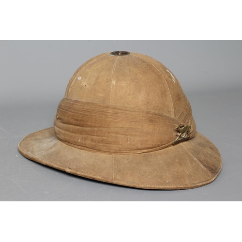 385 - AN IMPERIAL CAMEL CORPS PITH HELMET with ICC badge, internal broad arrow stamp and inscribed to T. W... 