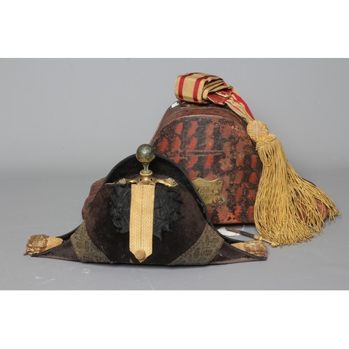 390 - AN EDWARDIAN ARMY OFFICER'S BEAVER SKIN BICORN HAT, set with a black gros grain rosette with gold la... 