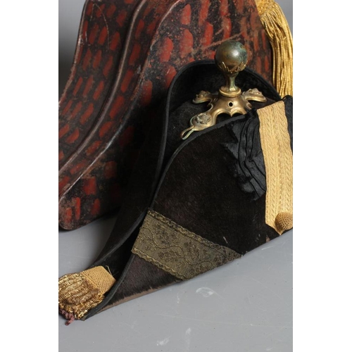 390 - AN EDWARDIAN ARMY OFFICER'S BEAVER SKIN BICORN HAT, set with a black gros grain rosette with gold la... 