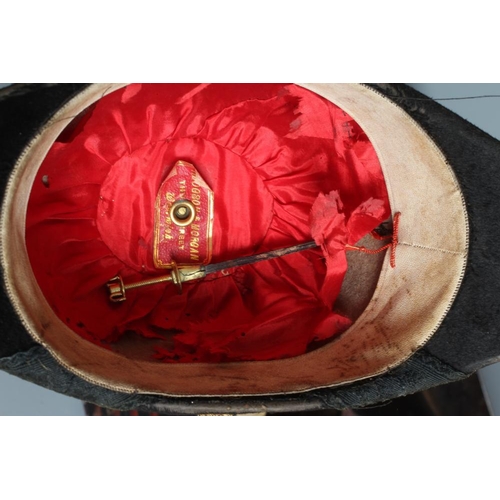 390 - AN EDWARDIAN ARMY OFFICER'S BEAVER SKIN BICORN HAT, set with a black gros grain rosette with gold la... 