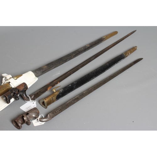 402 - TWO BRITISH PATTERN SOCKET BAYONETS, both with triangular section blades, brass and leather scabbard... 