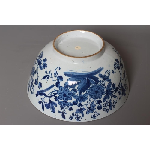 41 - A LARGE DELFT PUNCH BOWL, possibly Bristol c.1770, of plain circular form, the interior painted in b... 