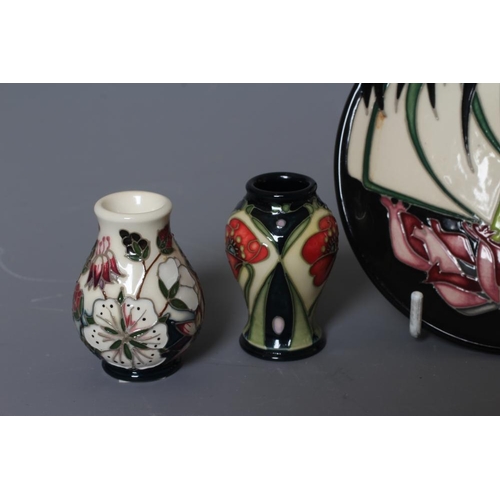 51 - FOUR MOORCROFT POTTERY MINIATURE VASES comprising September Glory, 2017, of squat baluster form, des... 