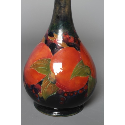 53 - A MOORCROFT POTTERY POMEGRANATE PATTERN BOTTLE VASE, impressed Moorcroft, Burslem, England, 80, sign... 