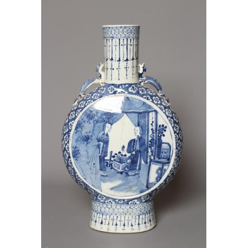 6 - A LARGE CHINESE MOONFLASK painted in underglaze blue with two ladies on a verandah, within a flowerh... 