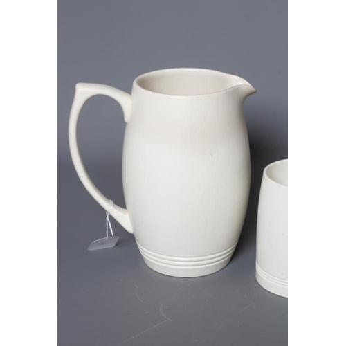 64 - KEITH MURRAY FOR WEDGWOOD - A MOONSTONE LEMONADE SET comprising six mugs and a jug, printed mark in ... 