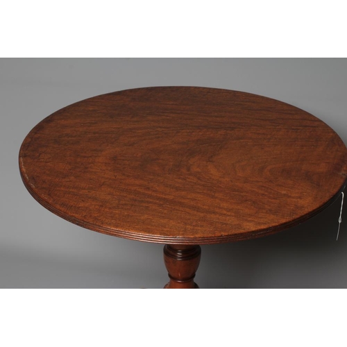 819 - A GEORGIAN MAHOGANY TRIPOD TABLE, third quarter 18th century and later, the circular tilt top with r... 