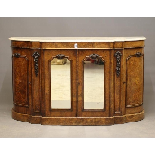 822 - A VICTORIAN BURR WALNUT CREDENZA, third quarter 19th century, of serpentine outline with white marbl... 