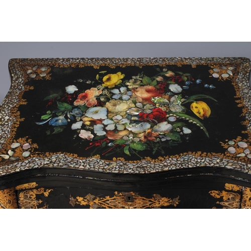 827 - A VICTORIAN PAPIER MACHE WORK/GAMES TABLE, third quarter 19th century, the oblong serpentine top pai... 