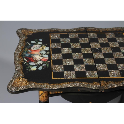 827 - A VICTORIAN PAPIER MACHE WORK/GAMES TABLE, third quarter 19th century, the oblong serpentine top pai... 