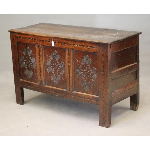 830 - A JOINED OAK PANELLED CHEST, Yorkshire, Bradford/Halifax area, late 17th century, the hinged moulded... 