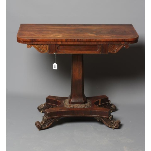 832 - A GEORGE IV ROSEWOOD FOLDING CARD TABLE, early 19th century, the rounded oblong swivel top opening t... 