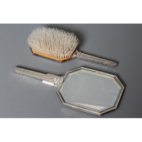 86 - A TIFFANY HAND MIRROR AND HAIR BRUSH, stamped Tiffany & Co. Makers, Sterling Silver, 20501A and 2050... 