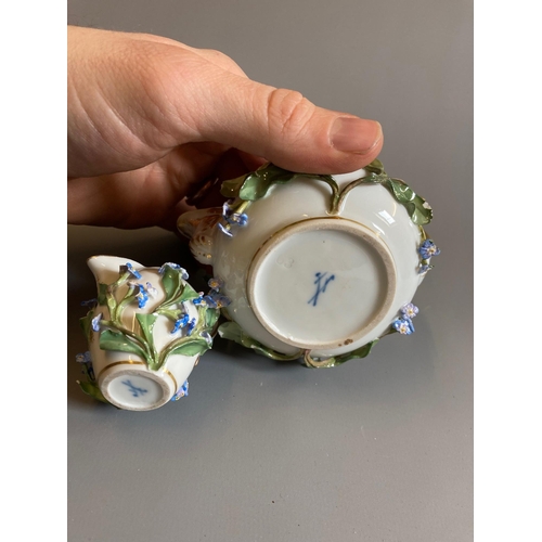 23 - A MEISSEN PORCELAIN CABINET ROSE WATER SPRINKLER AND COVER of squat globular form with high scroll h... 