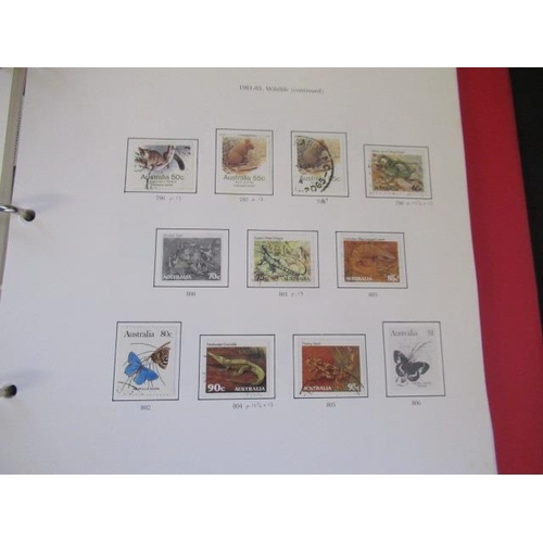 712 - TWO AUSTRALIAN ALBUMS OF STAMPS