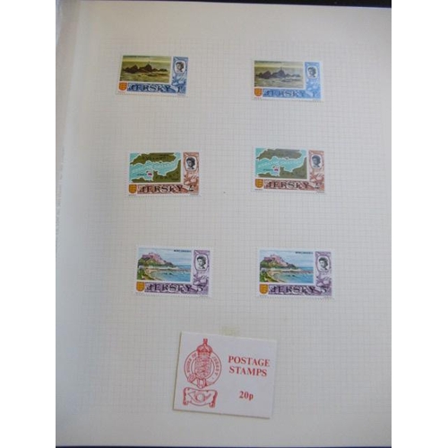 794 - TWO ALBUMS OF MINT ISLE OF MAN, JERSEY AND WORLD STAMPS