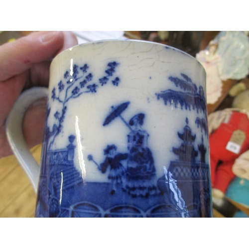 385 - THREE ROYAL WORCESTER FIGURES AND A BLUE AND WHITE MUG