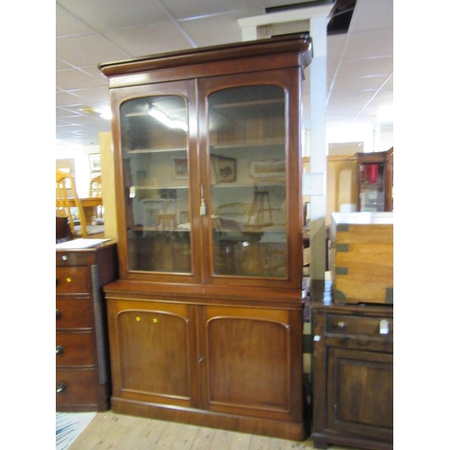 1012 - VICTORIAN MAHOGANY BOOKCASE ON CUPBOARD