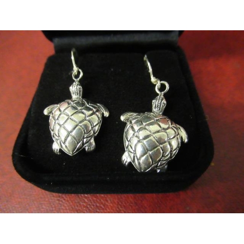 218 - PAIR OF WHITE METAL TURTLE EARRINGS