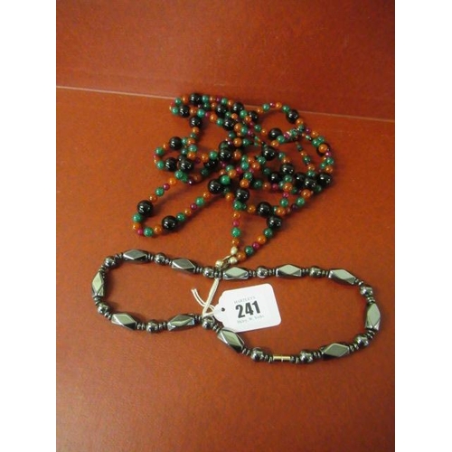 241 - ONYX AND HARDSTONE NECKLACE WITH SILVER CLASP AND ANOTHER