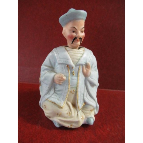 322A - PORCELAIN NODDING ORIENTAL GENTLEMAN