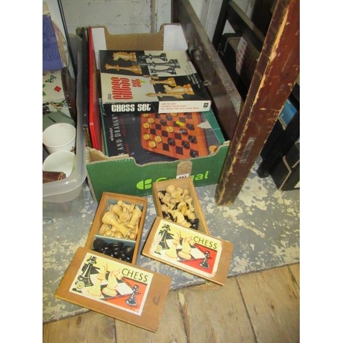 467 - BOX OF CHESS GAMES INCLUDING TWO WOODEN CHESS SETS