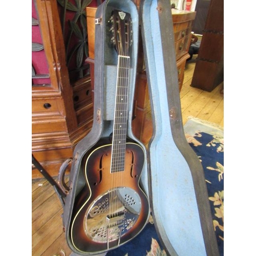72 - DOBRO CASED GUITAR BY MONARCH AND STAND