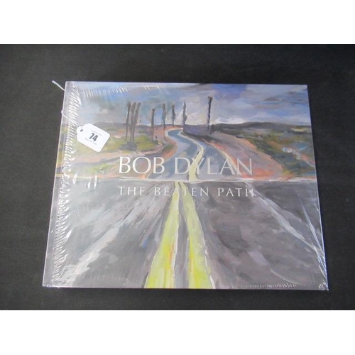 74 - BOB DYLAN THE BEATEN PATH, HALCYON GALLERY, PORTFOLIO BOOK IN CELLOPHANE