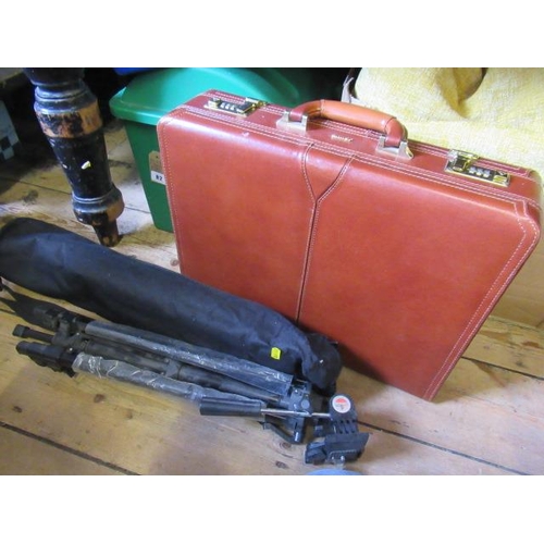 81 - LEATHER ANTLER BRIEFCASE AND TWO TRIPODS