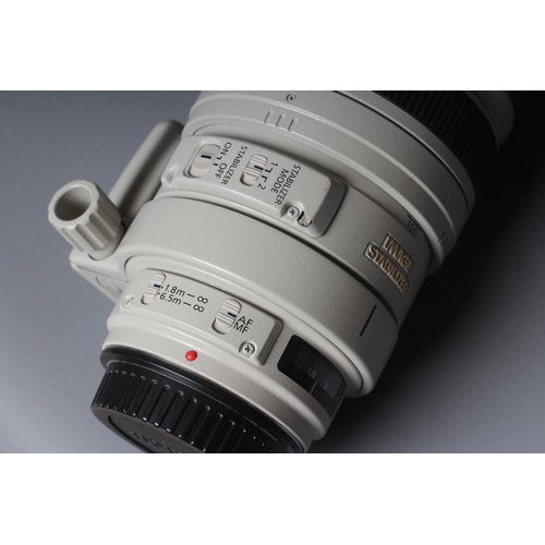 479 - A CANON ULTRASONIC ZOOM LENS, EF 100-400mm, 1:4.5-5.6 L IS, with Jessops Skylight 1A filter, and cas... 