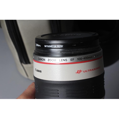 479 - A CANON ULTRASONIC ZOOM LENS, EF 100-400mm, 1:4.5-5.6 L IS, with Jessops Skylight 1A filter, and cas... 