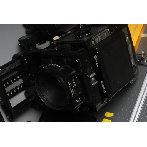 482 - A FUJI GX680 II PROFESSIONAL CAMERA with 135 1:5.6 EBC Fujinon GX lens, Metz 45 CT-5 flash and alloy... 