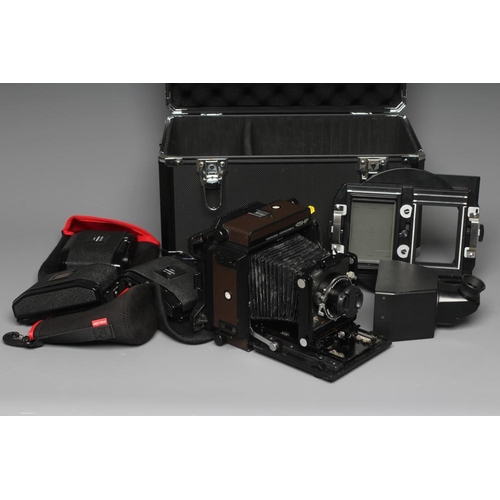 483 - A TOPCON HORSEMAN 45HF CAMERA with a Super Topcor 1:56 f=150mm lens, rotary back, viewer and black m... 