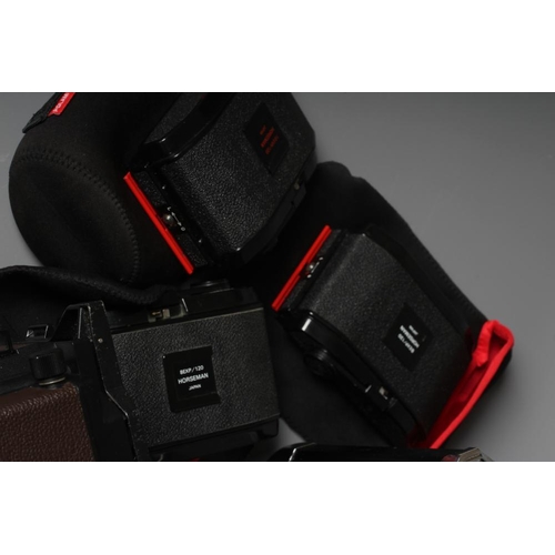 483 - A TOPCON HORSEMAN 45HF CAMERA with a Super Topcor 1:56 f=150mm lens, rotary back, viewer and black m... 