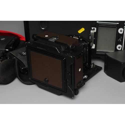 483 - A TOPCON HORSEMAN 45HF CAMERA with a Super Topcor 1:56 f=150mm lens, rotary back, viewer and black m... 