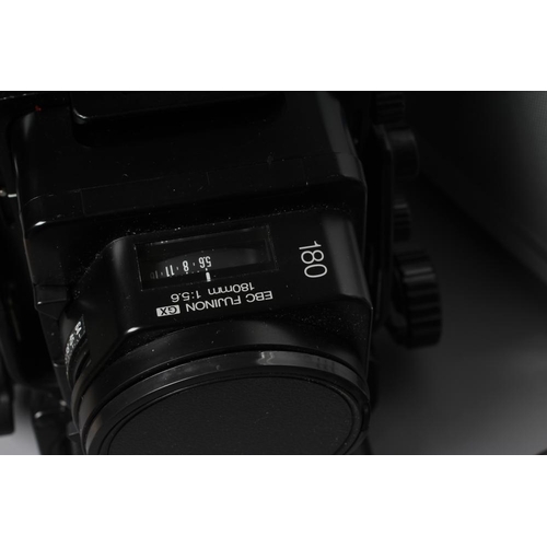 484 - A FUJI PROFESSIONAL 6X8 CAMERA with EBC Fujinon 180mm 1:5.6 180 lens and metal carrying case (Est. p... 