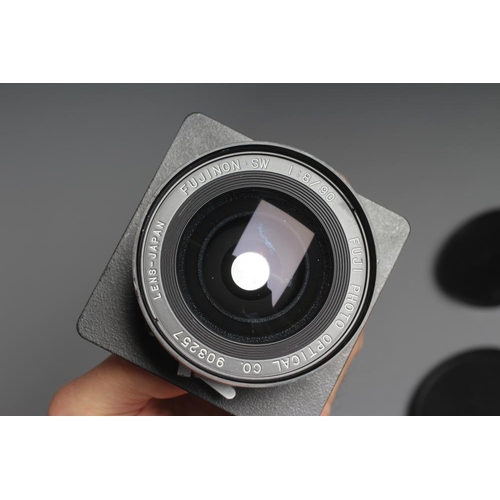 490 - TWO CAMERA LENSES, comprising a Copal No.1 Symmar-S 5,6/210 lens, and a Fujinon SW 1:8/90 lens (Est.... 
