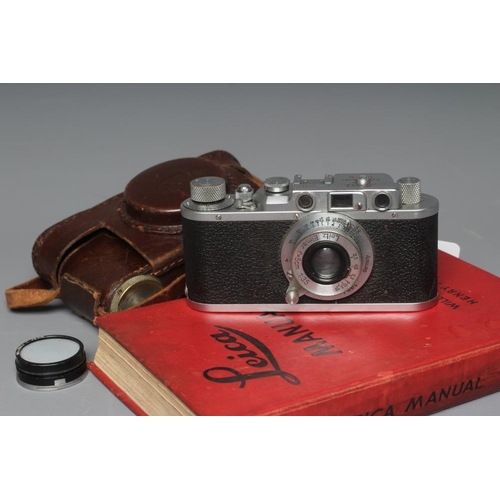491 - A LEICA CAMERA, no. 263731, with Leitz Elmar f=5cm 1:35 lens, leather case and manual (Est. plus 24%... 