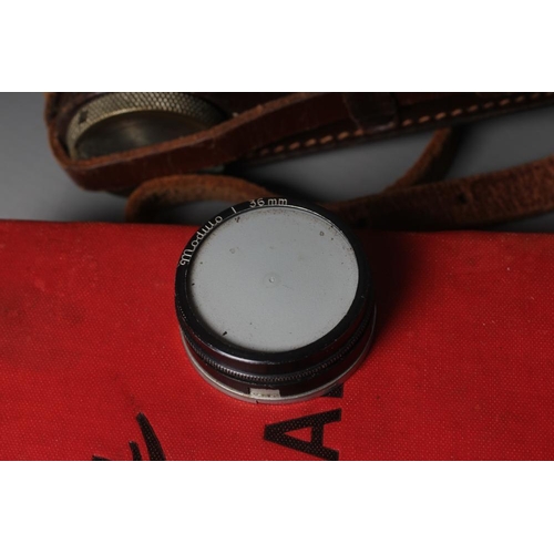 491 - A LEICA CAMERA, no. 263731, with Leitz Elmar f=5cm 1:35 lens, leather case and manual (Est. plus 24%... 