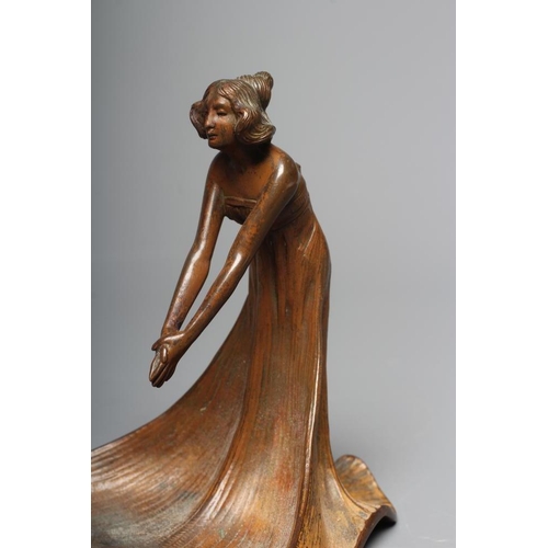 493 - AN ART NOUVEAU PATINATED COPPER FIGURAL DISH modelled as a young lady wearing a flowing dress, leani... 