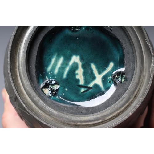 494 - AN ART NOUVEAU EARTHENWARE VASE BY J. VON SCHWARZ of bulbous form with rounded trefoil neck in a str... 